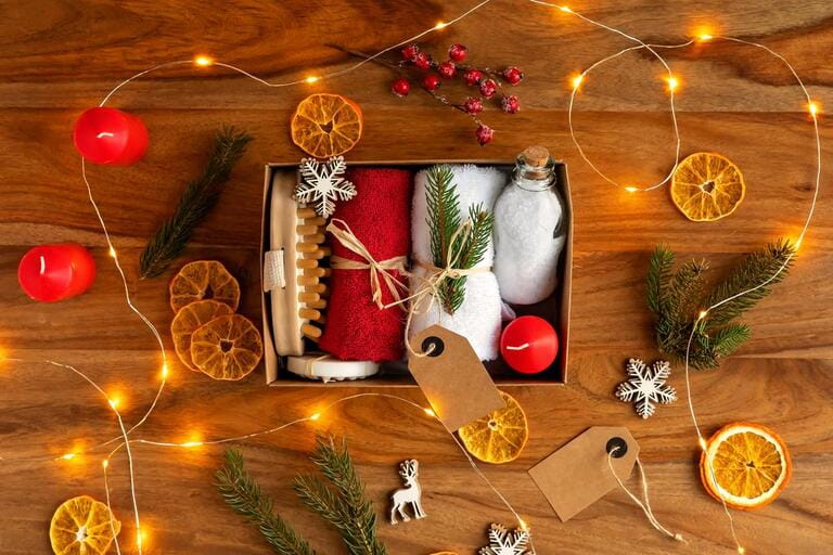 Packing homemade seasonal gift box or self care package with bath accessories. Sustainable Christmas, zero waste, plastic free. Packing homemade seasonal gift box or self care package with bath accessories. Sustainable Christmas, zero waste, plastic free.