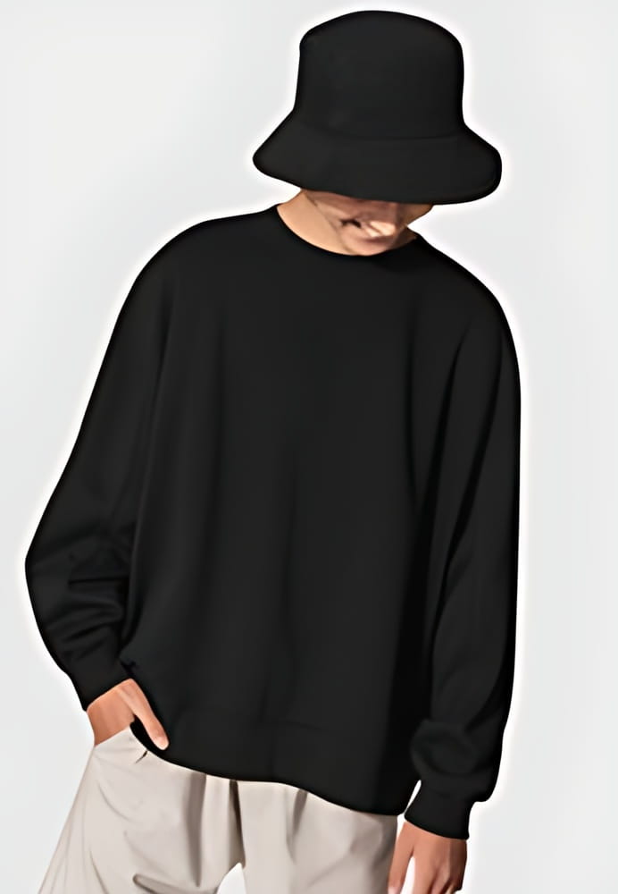 Man in black sweater and black bucket hat youth apparel shoot