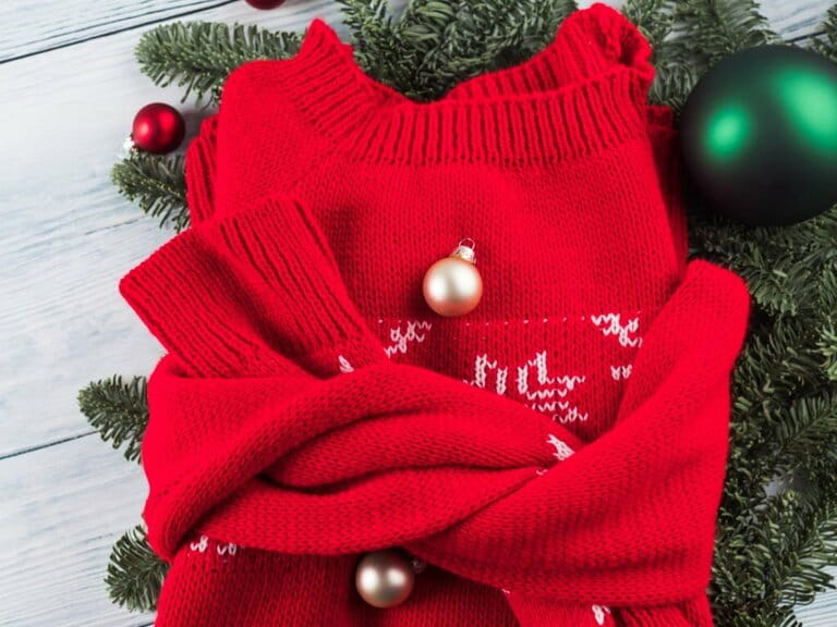 Red ugly Christmas sweater with green ornaments Red ugly Christmas sweater with green ornaments
