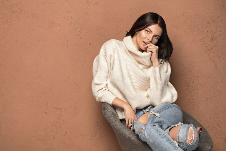 Fashionable woman in warm sweater Fashionable woman in warm sweater